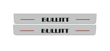 Catalog illustration of two long gray door sill plates with black Bullitt lettering and red horizontal lines on a white background.