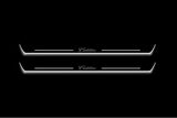 Cadillac Escalade IV 2014+ illuminated entry guards in stainless steel with Cadillac logo