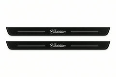 Catalogue illustration of two front black Matte PRO LED door sill plates with illuminated Cadillac lettering for Cadillac Escalade; dimensions are selected during manufacture.
