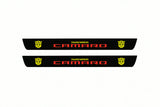Catalogue illustration of two front black Matte PRO LED door sill plates with illuminated Camaro Transformers lettering for Chevrolet Camaro E37; dimensions are selected during manufacture.
