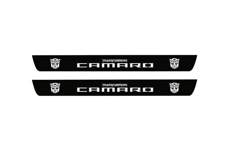 Catalogue illustration of two front black Matte PRO LED door sill plates with illuminated Camaro Transformers lettering for Chevrolet Camaro E37; dimensions are selected during manufacture.