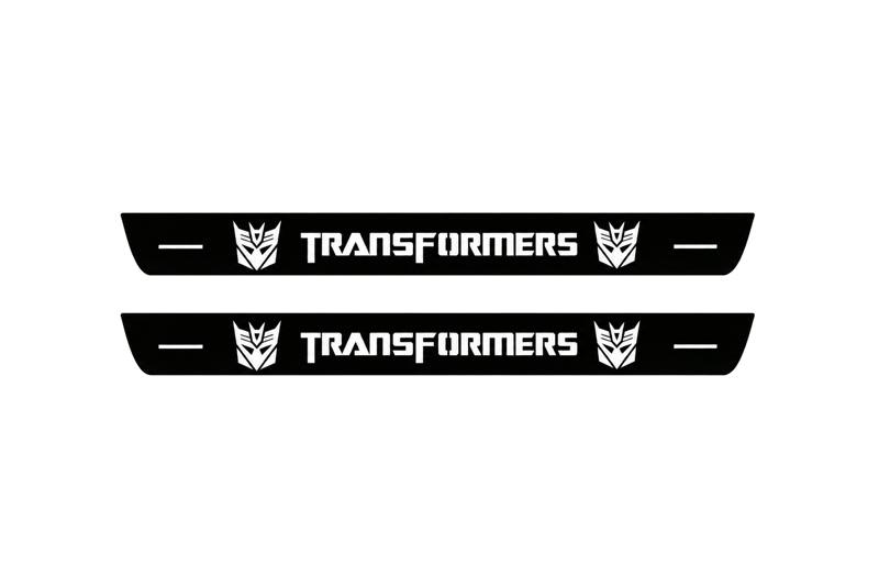Catalogue illustration of two front black Matte PRO LED door sill plates with illuminated Transformers Decepticon lettering for Chevrolet Camaro E37; dimensions are selected during manufacture.