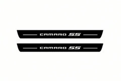 Catalogue illustration of two front black Matte PRO LED door sill plates with illuminated Camaro SS lettering for Chevrolet Camaro VI; dimensions are selected during manufacture.