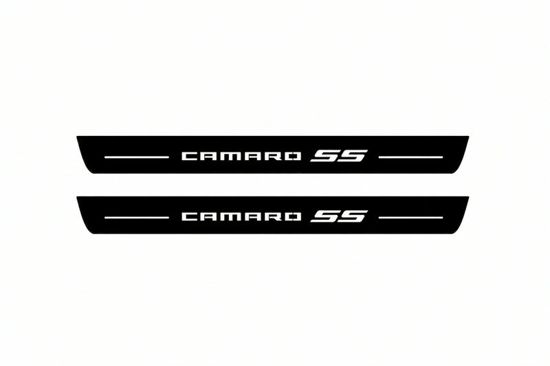 Catalogue illustration of two front black Matte PRO LED door sill plates with illuminated Camaro SS lettering for Chevrolet Camaro VI; dimensions are selected during manufacture.