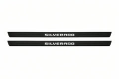 Catalogue illustration of two front black Matte PRO LED door sill plates with illuminated Silverado lettering for Chevrolet Silverado K2XX; dimensions are selected during manufacture.