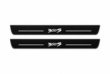 Catalogue illustration of two front black Matte PRO LED door sill plates with illuminated 300S T2 lettering for Chrysler 300 Sedan LD; the FRONT+REAR option includes rear plates not shown; final dimensions are selected during manufacture.