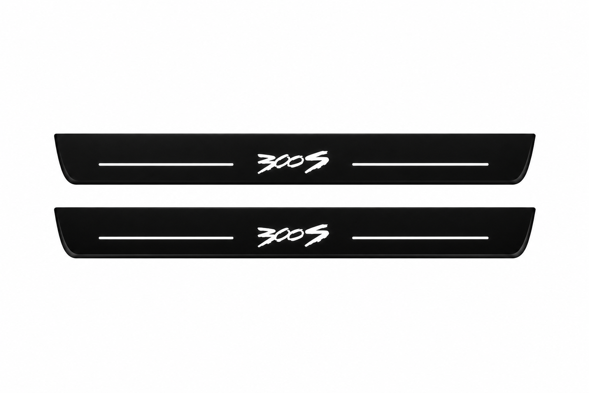 Catalogue illustration of two front black Matte PRO LED door sill plates with illuminated 300S T2 lettering for Chrysler 300 Sedan LD; the FRONT+REAR option includes rear plates not shown; final dimensions are selected during manufacture.