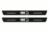 Catalogue illustration of two front black Matte PRO LED door sill plates with illuminated 426 Mopar Hellephant lettering for Chrysler 300 Sedan LD; the FRONT+REAR option includes rear plates not shown; final dimensions are selected during manufacture.