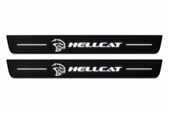 Catalogue illustration of two front black Matte PRO LED door sill plates with illuminated HELLCAT lettering for Chrysler 300 Sedan LD; the FRONT+REAR option includes rear plates not shown; final dimensions are selected during manufacture.
