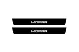 Catalogue illustration of two front black Matte PRO LED door sill plates with illuminated MOPAR lettering for Chrysler 300 Sedan LD; the FRONT+REAR option includes rear plates not shown; final dimensions are selected during manufacture.