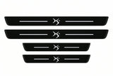 Catalog illustration of two front and two rear black Matte PRO LED door sill plates with illuminated DS4 lettering for Citroën DS4 B75.
