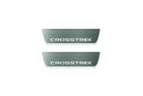 Two short silver-finished door sill plates with Crosstrek lettering on a light background, straight-on view.