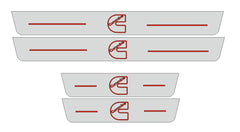 Catalog illustration of four gray door sill plates with red Cummins emblems and horizontal lines on a white background.
