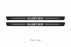 Dacia Duster HS Matte PRO catalogue illustration: two flat black FRONT plates with illuminated DUSTER lettering on white background