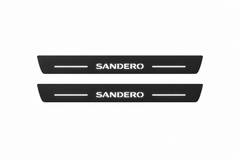 Catalogue illustration showing 2 black Matte PRO LED door sill plates with white Sandero lettering for Dacia Sandero B8; dimensions are selected during manufacture.