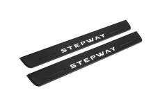 Matte PRO catalogue illustration showing two FRONT plates with illuminated Stepway lettering on a white background; Dacia Sandero Stepway B8 dimensions are selected during manufacture; rear plates are not pictured.