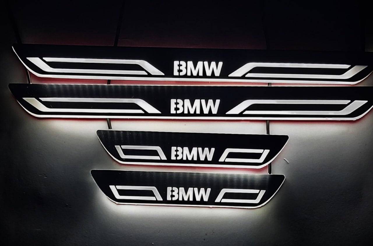 BMW 3 E90 2008+ illuminated entry guards in stainless steel with BMW LINE logo