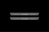 Citroen C5 II 2008+ illuminated entry guards in stainless steel with Citroen logo