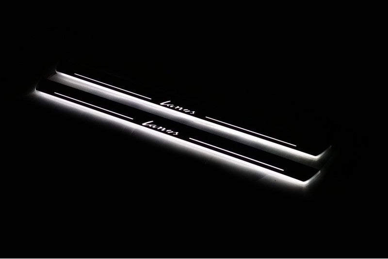 Daewoo Lanos 1997+ illuminated entry guards in stainless steel with Lanos logo