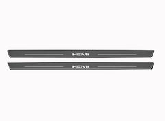Catalog illustration of two gray door sill plates with white HEMI lettering and horizontal lines.