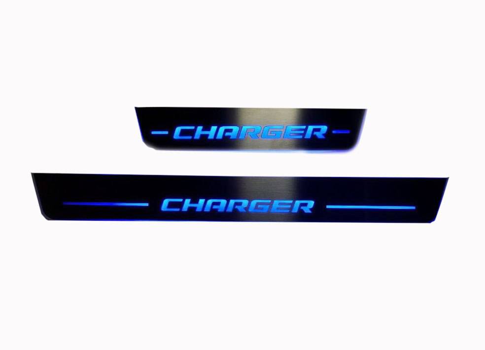 One long and one short dark door sill plate with blue Charger lettering and horizontal lines on a light background.