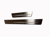 One long and one short silver-finished door sill plate with Charger lettering and horizontal slots on a light background.