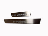 One long and one short silver-finished door sill plate with Charger lettering.