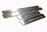Four silver-finished door sill plates with Hellcat lettering and head emblems, angled view.