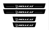Catalog illustration of four black door sill plates with white Hellcat lettering and head emblems.