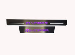 One long and one short reflective door sill plate with purple Mopar lettering and emblems.