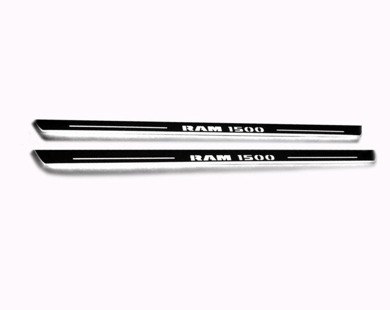 RAM 1500 V 2019+ illuminated door sill protectors in stainless steel with Illuminated RAM 1500 logo