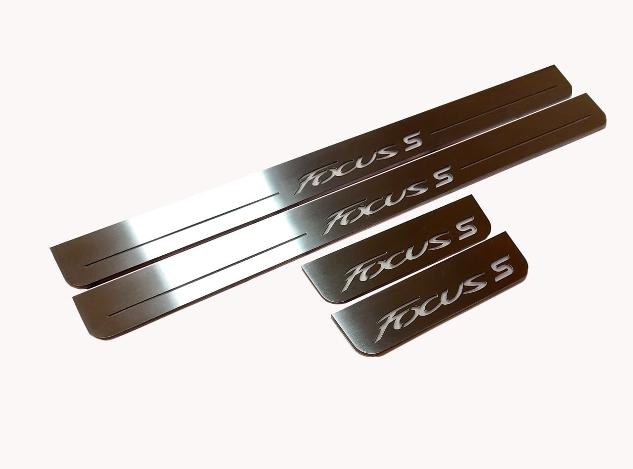 Ford Focus III 2011+ LED door sill plates in stainless steel with Focus S logo