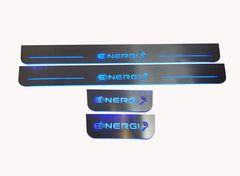 Four reflective door sill plates with blue Energi lettering and plug-and-arrow emblems on a light background.