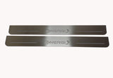 Two long silver-finished door sill plates with unframed Energi lettering, plug and arrow emblems.