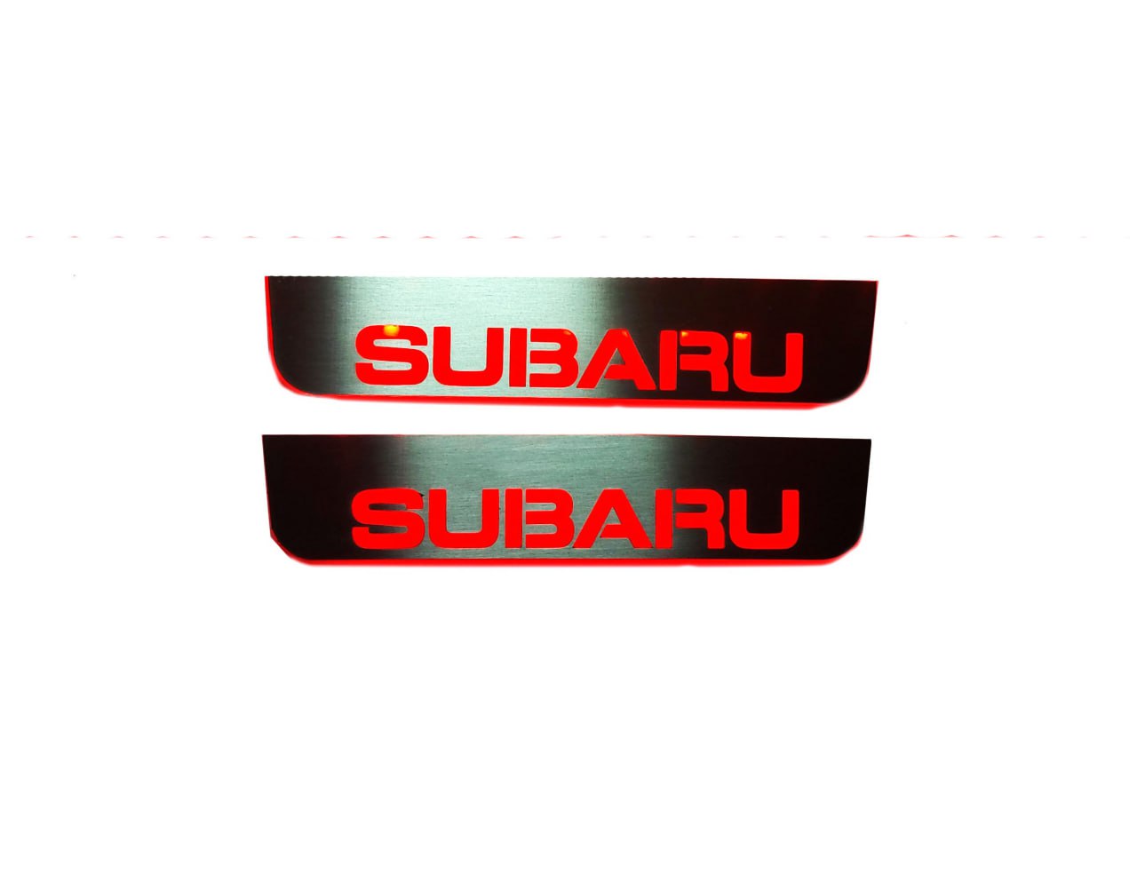 Subaru Forester IV 2012+ illuminated entry guards in stainless steel with Forester logo
