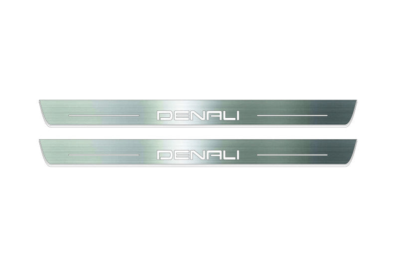 Two long silver-finished door sill plates with Denali lettering on a light background, straight-on view.