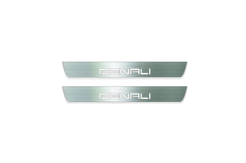Two short silver-finished door sill plates with Denali lettering on a light background, straight-on view.