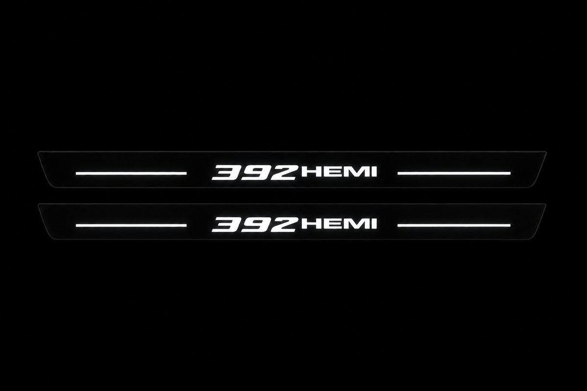392 HEMI Matte PRO black front pair, two long plates, white illuminated logo and bars; night visualization.