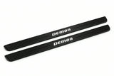 Catalogue illustration of two front black Matte PRO LED door sill plates with illuminated DEMON lettering for Dodge Challenger Coupe LC; dimensions are selected during manufacture.