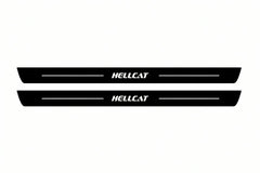 Catalogue illustration of two front black Matte PRO LED door sill plates with illuminated HELLCAT lettering for Dodge Challenger Coupe LC; dimensions are selected during manufacture.