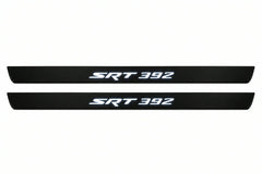 Catalogue illustration of two front black Matte PRO LED door sill plates with illuminated SRT 392 lettering for Dodge Challenger Coupe LC; dimensions are selected during manufacture.