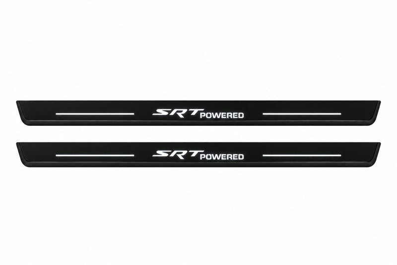 Catalog illustration of two front black Matte PRO LED door sill plates with illuminated SRT Powered lettering for Dodge Challenger Coupe LC.