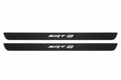 Catalogue illustration of two front black Matte PRO LED door sill plates with illuminated SRT8 lettering for Dodge Challenger Coupe LC; dimensions are selected during manufacture.