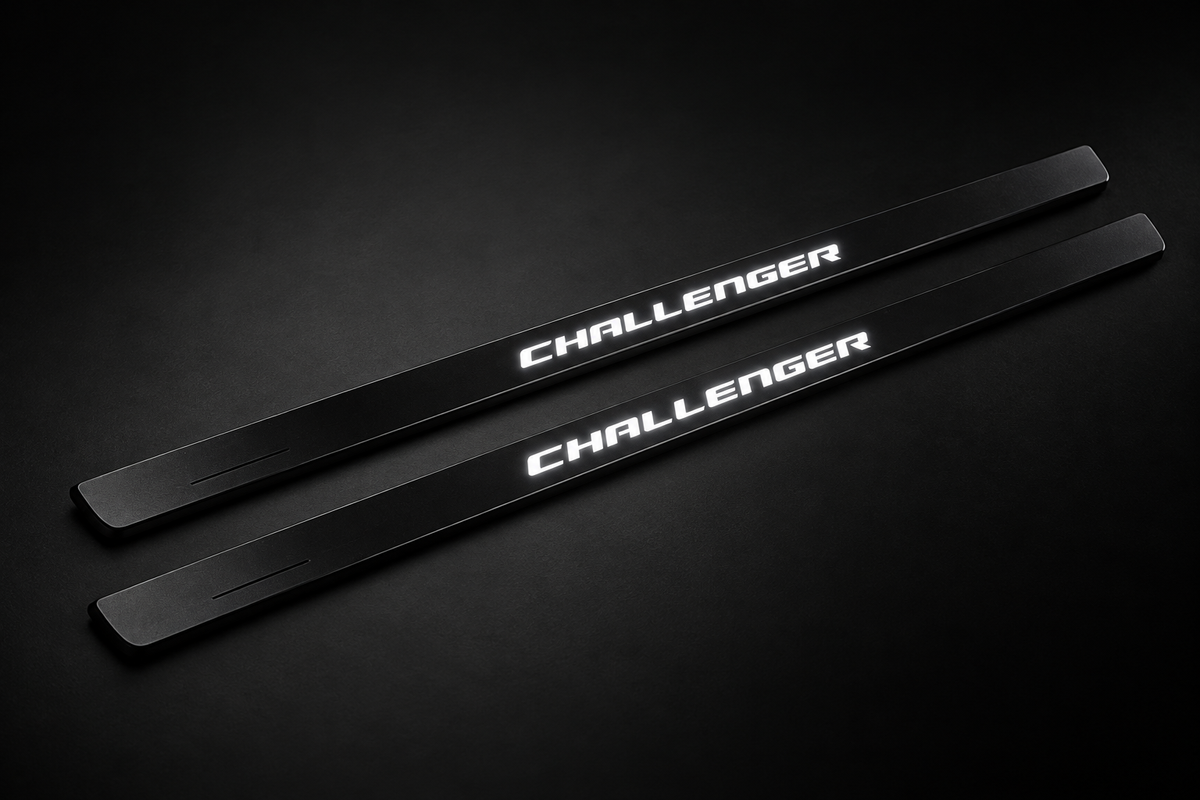 Challenger Matte PRO FRONT kit — two black matte door sill plates with white illuminated lettering