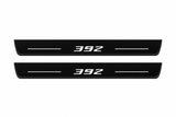 Catalogue illustration of two front black Matte PRO LED door sill plates with illuminated 392 lettering for Dodge Charger Sedan LD; the FRONT+REAR option includes rear plates not shown; final dimensions are selected during manufacture.