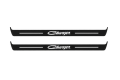 Catalogue illustration showing 2 black Matte PRO LED door sill plates with white Charger Cursive lettering for Dodge Charger Sedan LD; dimensions are selected during manufacture.