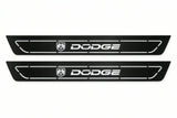 Catalogue illustration of two front black Matte PRO LED door sill plates with illuminated DODGE lettering for Dodge Charger Sedan LD; the FRONT+REAR option includes rear plates not shown; final dimensions are selected during manufacture.