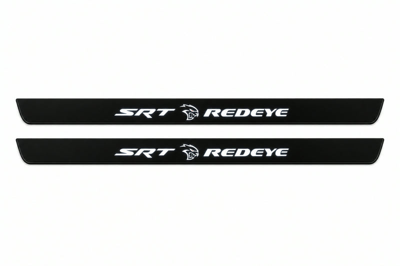 Catalogue illustration of two front black Matte PRO LED door sill plates with illuminated SRT REDEYE lettering for Dodge Charger Sedan LD; dimensions are selected during manufacture.