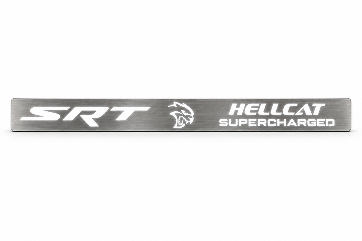 SRT Hellcat Supercharged brushed stainless door sill design with white LED artwork on white.