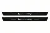 Catalogue illustration of two front black Matte PRO LED door sill plates with illuminated Hennessey lettering for Dodge Durango III; dimensions are selected during manufacture.
